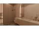 Contemporary bathroom with dual vanities, walk-in shower, and modern fixtures at 6649 E Ocotillo Rd, Paradise Valley, AZ 85253
