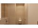 Well-designed bathroom with neutral color scheme and modern toilet at 6649 E Ocotillo Rd, Paradise Valley, AZ 85253