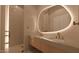 Contemporary bathroom with double sinks, accent lighting, and sleek design at 6649 E Ocotillo Rd, Paradise Valley, AZ 85253