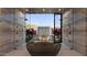 Modern bathroom featuring a freestanding tub, double showers, and a view of the serene outdoors at 6649 E Ocotillo Rd, Paradise Valley, AZ 85253