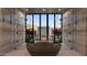 Modern bathroom showcasing a freestanding tub and double showers, and a view of the serene outdoors at 6649 E Ocotillo Rd, Paradise Valley, AZ 85253