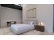 Bright bedroom features modern furniture, light-colored decor, and a contemporary style desk with a chair at 6649 E Ocotillo Rd, Paradise Valley, AZ 85253