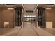 Elegant foyer featuring a wine storage wall and open floor plan at 6649 E Ocotillo Rd, Paradise Valley, AZ 85253