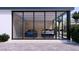 Stylish garage with floor-to-ceiling windows showcasing luxury cars in an organized space at 6649 E Ocotillo Rd, Paradise Valley, AZ 85253