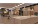 Open concept view from kitchen to dining and living room area at 6649 E Ocotillo Rd, Paradise Valley, AZ 85253