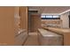 Modern kitchen with marble countertops, custom cabinetry, and an open design for entertaining at 6649 E Ocotillo Rd, Paradise Valley, AZ 85253