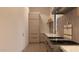 Stylish kitchen showcasing a gas range, bright countertops, and shaker style cabinets at 6649 E Ocotillo Rd, Paradise Valley, AZ 85253