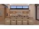 Modern kitchen featuring a large dining table and stylish pendant lighting at 6649 E Ocotillo Rd, Paradise Valley, AZ 85253