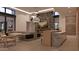Inviting living room showcases a fireplace, a sleek media center and contemporary furnishings at 6649 E Ocotillo Rd, Paradise Valley, AZ 85253