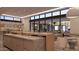 Bright open living space seamlessly integrates kitchen, seating, and outdoor views for a comfortable living experience at 6649 E Ocotillo Rd, Paradise Valley, AZ 85253