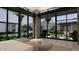 Main bedroom featuring large windows with views of the pool and patio area at 6649 E Ocotillo Rd, Paradise Valley, AZ 85253