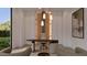 Modern office space featuring a sleek desk, comfortable chairs, and stylish pendant lighting at 6649 E Ocotillo Rd, Paradise Valley, AZ 85253