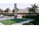 Stunning pool area with elegant water features, manicured greenery, and beautiful desert views at 6649 E Ocotillo Rd, Paradise Valley, AZ 85253