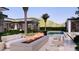 Beautiful pool and spa area featuring modern fire pit and lounge seating, ideal for outdoor relaxation at 6649 E Ocotillo Rd, Paradise Valley, AZ 85253