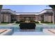 Elegant pool and water feature with modern home design, perfect for luxury outdoor living at 6649 E Ocotillo Rd, Paradise Valley, AZ 85253