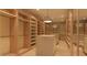 Expansive walk-in closet with custom shelving, hanging rods, and central island, providing abundant space at 6649 E Ocotillo Rd, Paradise Valley, AZ 85253