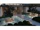 Stunning water feature with stepping stones and ambient lighting leading to the home's entrance at 6649 E Ocotillo Rd, Paradise Valley, AZ 85253