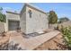 Backyard space with a garden, patio, and unique design elements offer a serene and private outdoor retreat at 703 E Corte Oro --, Phoenix, AZ 85020