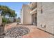 Charming backyard area showcasing a stucco home exterior, and a unique rock feature at 703 E Corte Oro --, Phoenix, AZ 85020