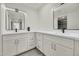 Modern bathroom with double vanity, sleek mirrors, and contemporary fixtures creating a luxurious feel at 703 E Corte Oro --, Phoenix, AZ 85020