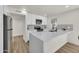 Bright kitchen features white cabinetry, stainless steel appliances, and a large island perfect for entertaining at 703 E Corte Oro --, Phoenix, AZ 85020