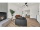 Modern living room featuring a fireplace and sleek furniture for a comfortable gathering space at 703 E Corte Oro --, Phoenix, AZ 85020