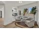 Cozy living room features a large window with lots of light, and comfortable chairs create a relaxing atmosphere at 703 E Corte Oro --, Phoenix, AZ 85020