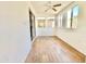 Bright sun room with tile floors, lots of windows, and sliding glass door at 723 S Weaver Dr, Apache Junction, AZ 85120