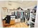 Spacious walk-in closet with rod and shelf storage at 723 S Weaver Dr, Apache Junction, AZ 85120