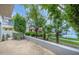 Backyard patio featuring view of lush landscaping, water feature, and outdoor relaxation space at 7272 E Gainey Ranch Rd # 117, Scottsdale, AZ 85258