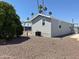 Exterior view of a manufactured home with xeriscaping and desert landscaping at 7300 N 51St Ave # G102, Glendale, AZ 85301