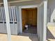 Interior of a storage shed with paint and supplies, offering practical organization and space at 7300 N 51St Ave # G102, Glendale, AZ 85301