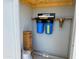 Close-up of a water filtration system with installed filters and connections, ensuring clean water at 7300 N 51St Ave # G102, Glendale, AZ 85301