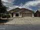 Charming single-story home with a neutral color palette and low maintenance landscaping at 8006 W Gibson Ln, Phoenix, AZ 85043