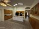 Spacious kitchen with tile floors, island sink, and plenty of cabinet space at 8006 W Gibson Ln, Phoenix, AZ 85043