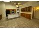 Expansive kitchen with central island, tile flooring, and abundant storage space at 8006 W Gibson Ln, Phoenix, AZ 85043