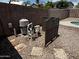 Pool equipment in the backyard includes a filter and plumbing at 8006 W Gibson Ln, Phoenix, AZ 85043