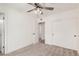 Bedroom with ceiling fan, carpet, and closet at 849 N Revere -- # E, Mesa, AZ 85201