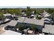 Aerial view of condo community featuring landscaped yards, tile roofs, and convenient parking at 860 N Mcqueen Rd # 1058, Chandler, AZ 85225