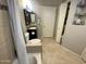 Bathroom featuring vanity, toilet, shower/bathtub, and neutral tiling at 860 N Mcqueen Rd # 1058, Chandler, AZ 85225