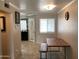 Dining room with dining table and entry into kitchen at 860 N Mcqueen Rd # 1058, Chandler, AZ 85225