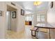 Dining room area featuring tiled floors, a small table with kitchen view at 860 N Mcqueen Rd # 1058, Chandler, AZ 85225