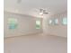 Bright living room features neutral walls, carpet, recessed lights and large windows with views at 881 E Boston St, Gilbert, AZ 85295