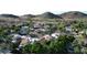 Luxury community surrounded by lush desert landscape and stunning mountain views in distance at 9430 S 47Th Pl, Phoenix, AZ 85044