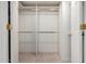 Empty walk-in closet with shelving and dual-door entry, ready for organization at 9430 S 47Th Pl, Phoenix, AZ 85044