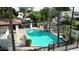 Beautiful, clean community pool with ample seating around the area, perfect for relaxing in the sun at 9430 S 47Th Pl, Phoenix, AZ 85044