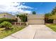 Charming home with mature landscaping, a two-car garage, and a well-manicured lawn at 9430 S 47Th Pl, Phoenix, AZ 85044