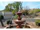 Front yard fountain makes for a spectacular entrance to your new home in a well-manicured community at 9430 S 47Th Pl, Phoenix, AZ 85044