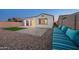 Paver patio with built in seating, low maintenance backyard and exterior lighting at 11626 E Yeager Cyn, Gold Canyon, AZ 85118