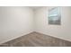Carpeted bedroom features neutral paint, carpet and a window with blinds at 11626 E Yeager Cyn, Gold Canyon, AZ 85118